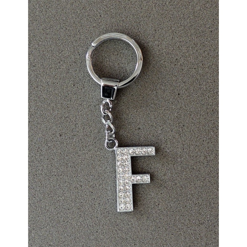 Porte-clés en acier avec l'initiale F incrustée de petits strass 