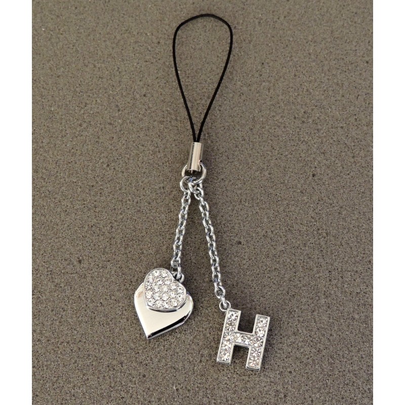 Bijou de sac en métal argenté personnalisé avec l'initiale H et des petits cœurs