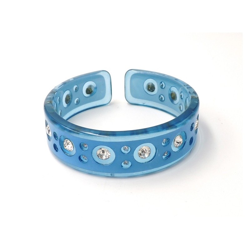 Bracelet en résine bleue transparente ornée de strass blancs