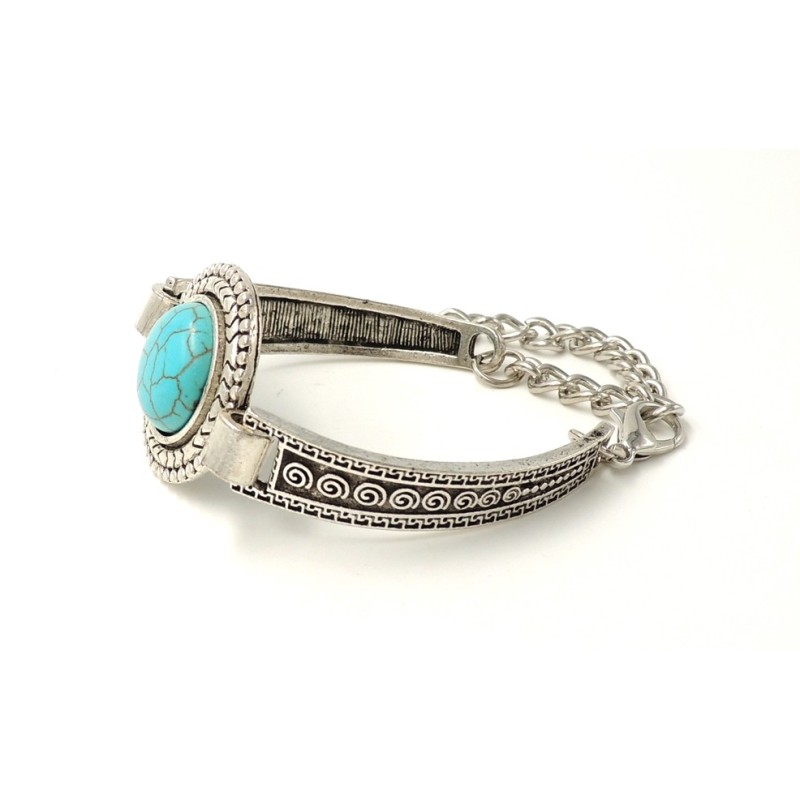 Bracelet tibétain en métal travaillé orné d'une pierre turquoise