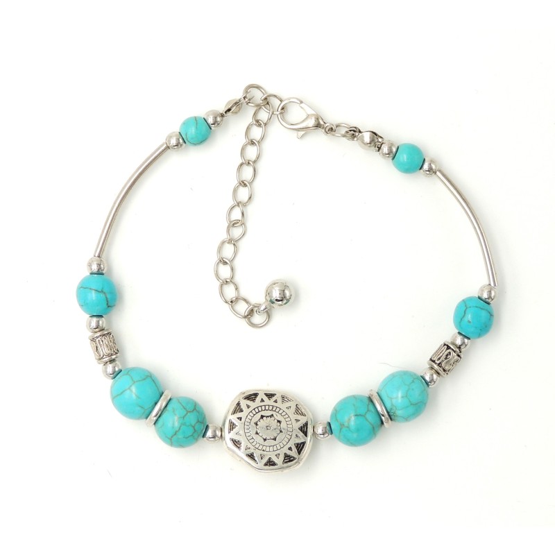 Bracelet tibétain avec des perles de pierre turquoise et métal argenté